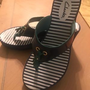 Clark’s navy stripe wedge flip flops